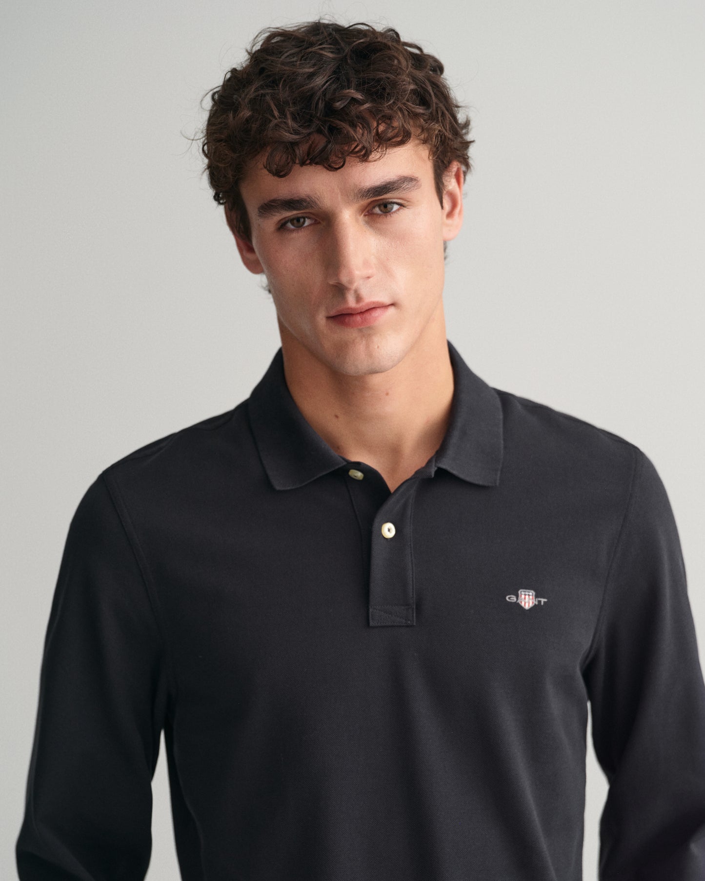BLACK, REG SHIELD LS PIQUE POLO, CLOSE-UP BY GANT AU.