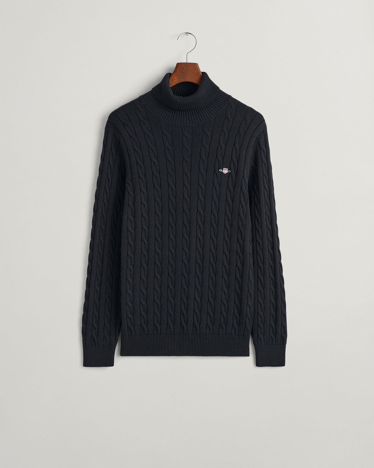 BLACK, COTTON CABLE TURTLE NECK, FLAT-LAY BY GANT AU.
