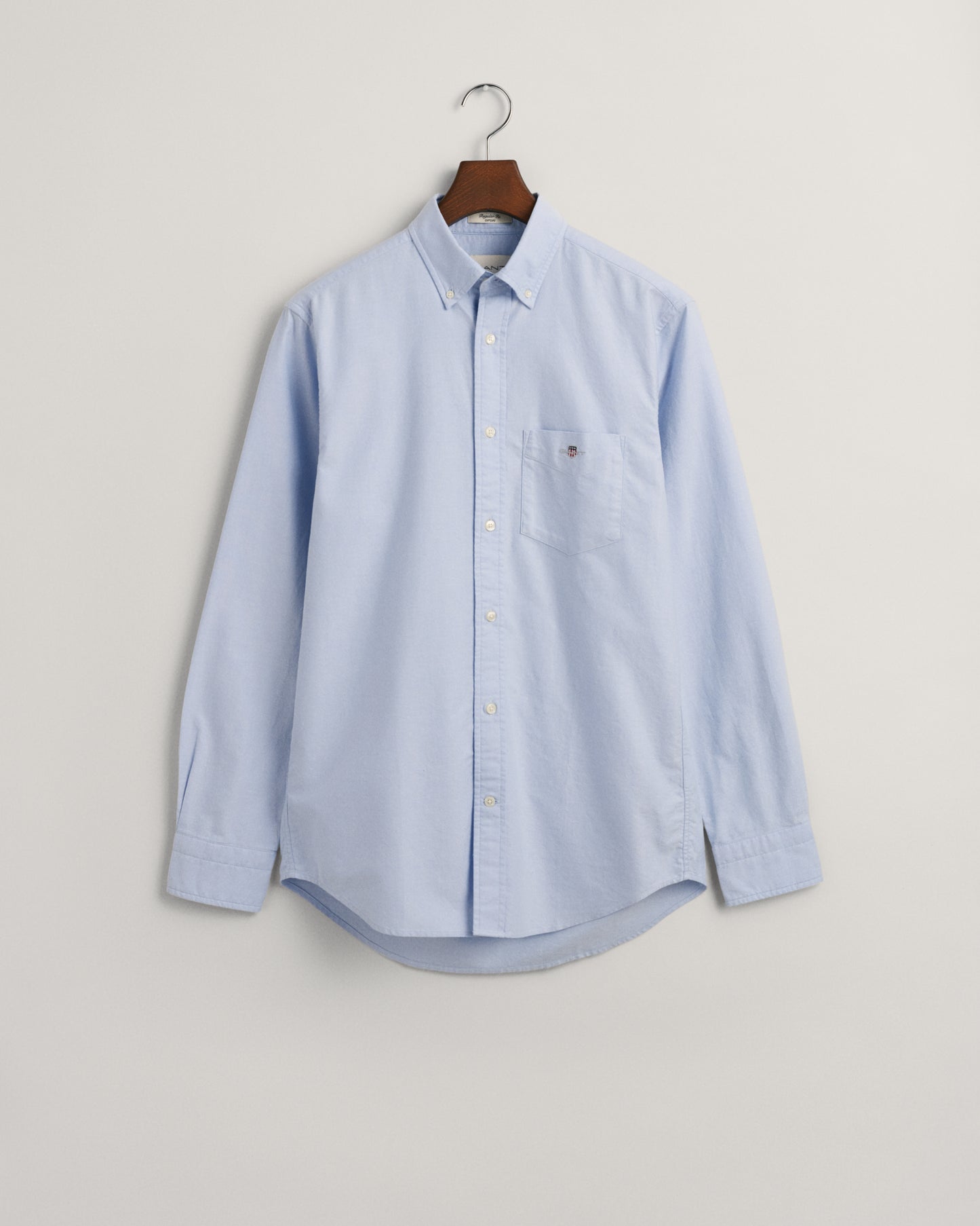 LIGHT BLUE, REG CLASSIC OXFORD SHIRT, FLAT-LAY BY GANT AU.