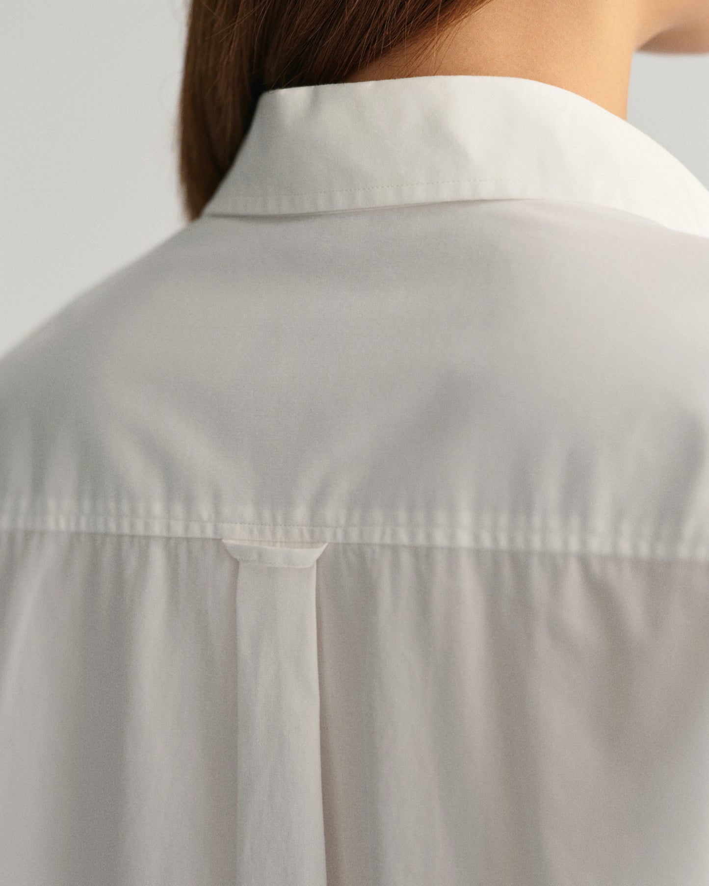 MODEL WEARING REL POPLIN SHIRT