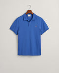 RICH BLUE, REG SHIELD SS PIQUE POLO, FLAT-LAY BY GANT AU.