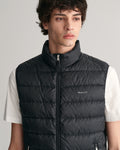 MODEL WEARING LIGHT DOWN VEST