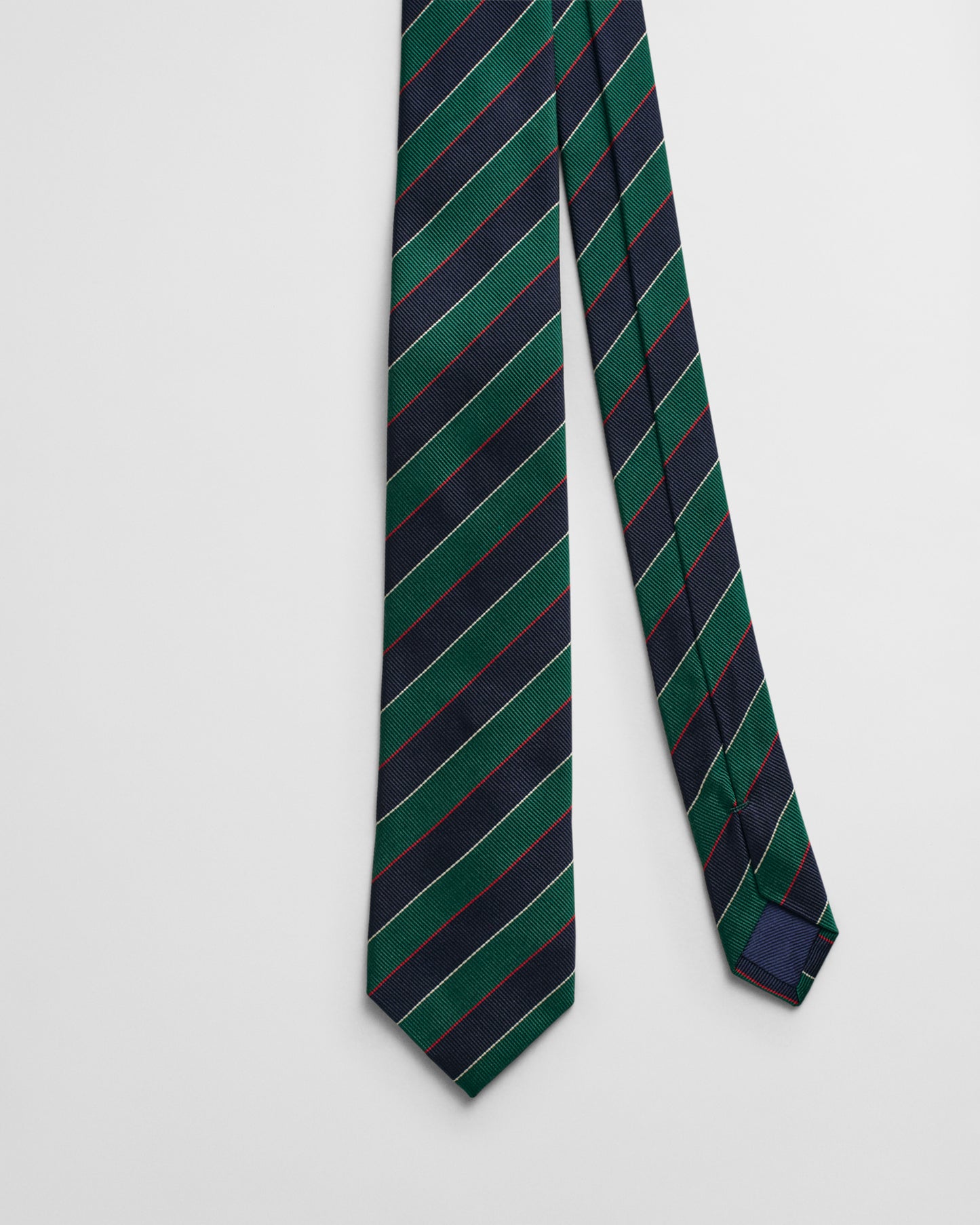 DEEP FOREST, STRIPED SILK TIE, CLOSE-UP BY GANT AU.