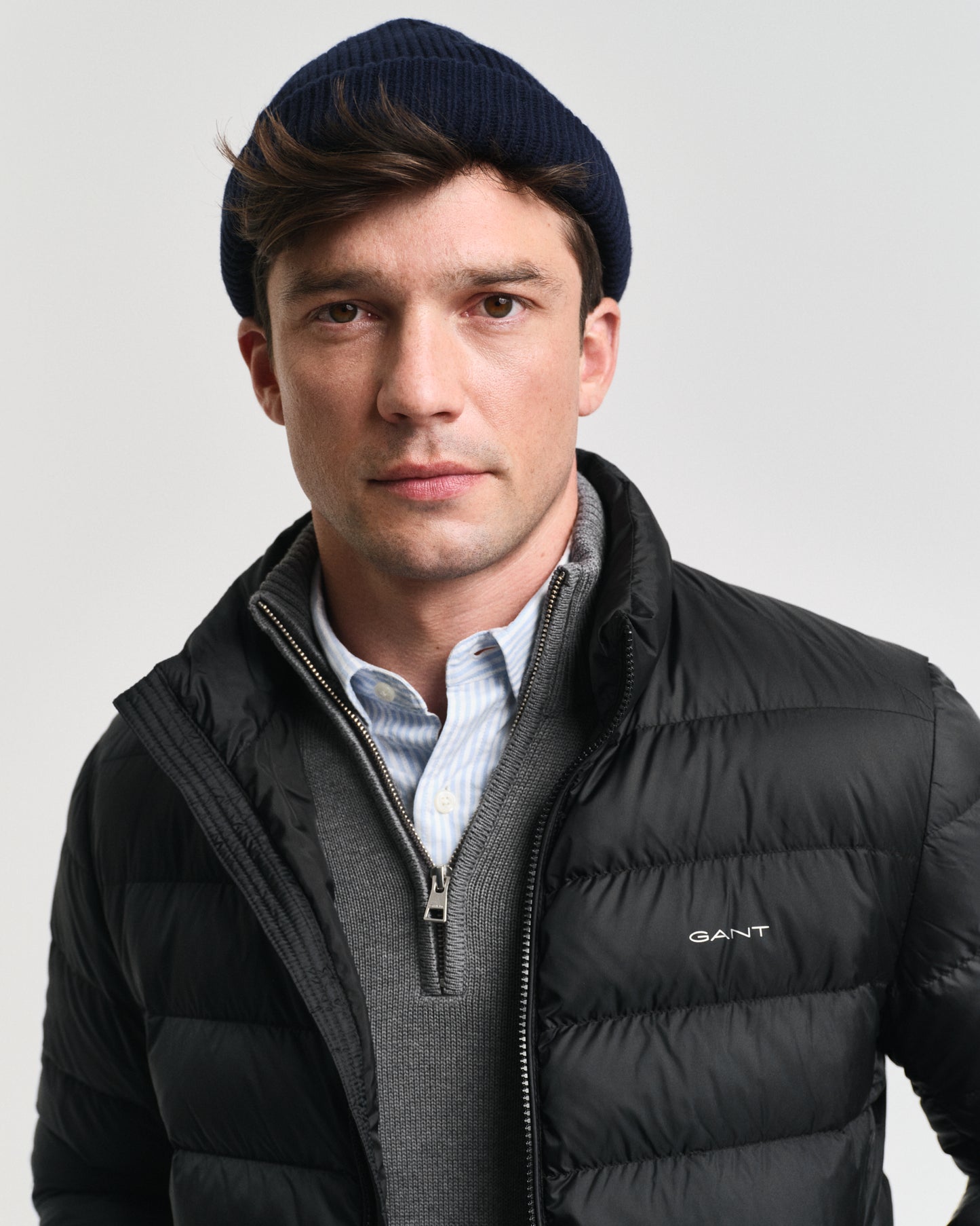 MODEL WEARING LIGHT DOWN JACKET