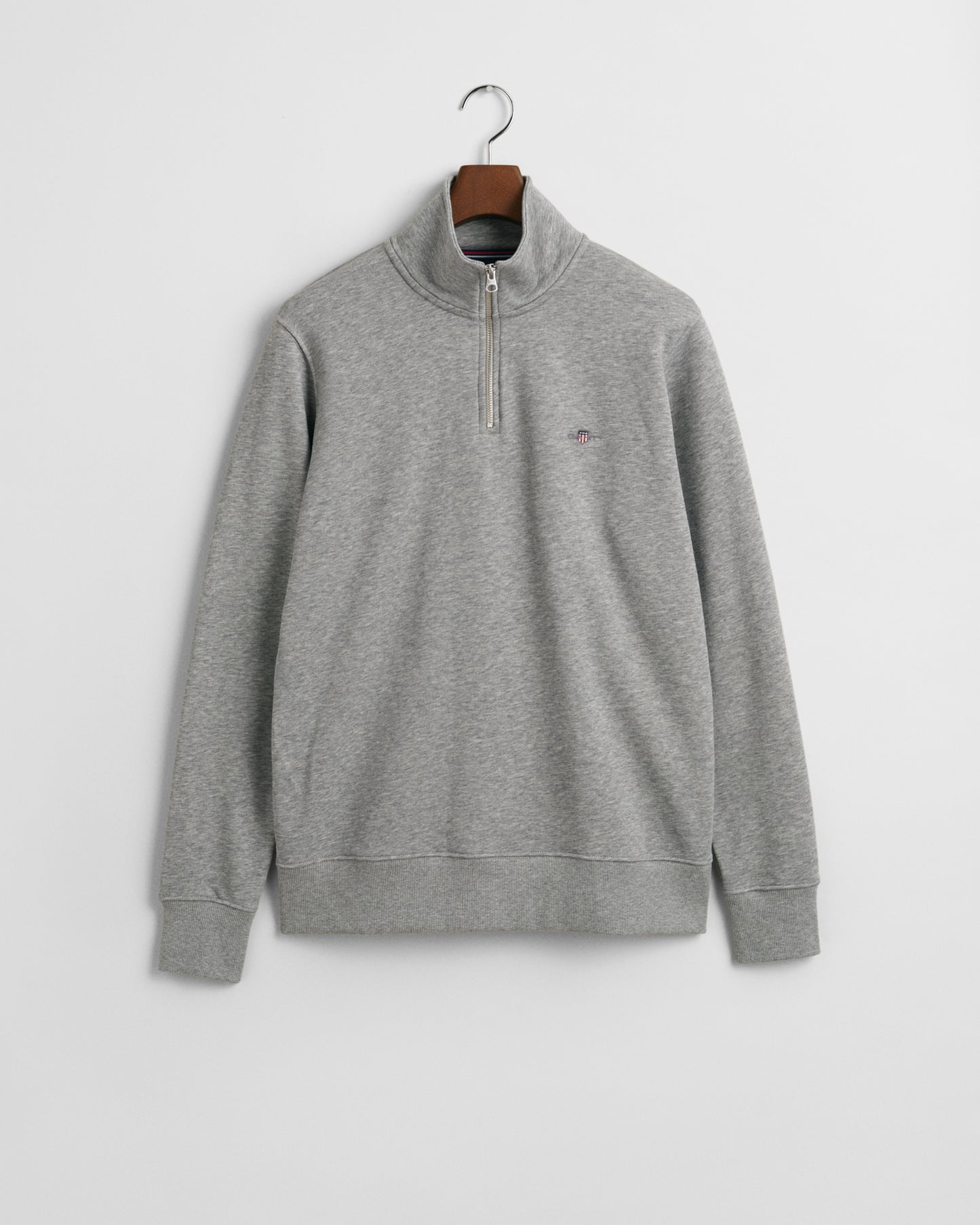 GREY MELANGE, REG SHIELD HALF ZIP SWEAT, FLAT-LAY BY GANT AU.