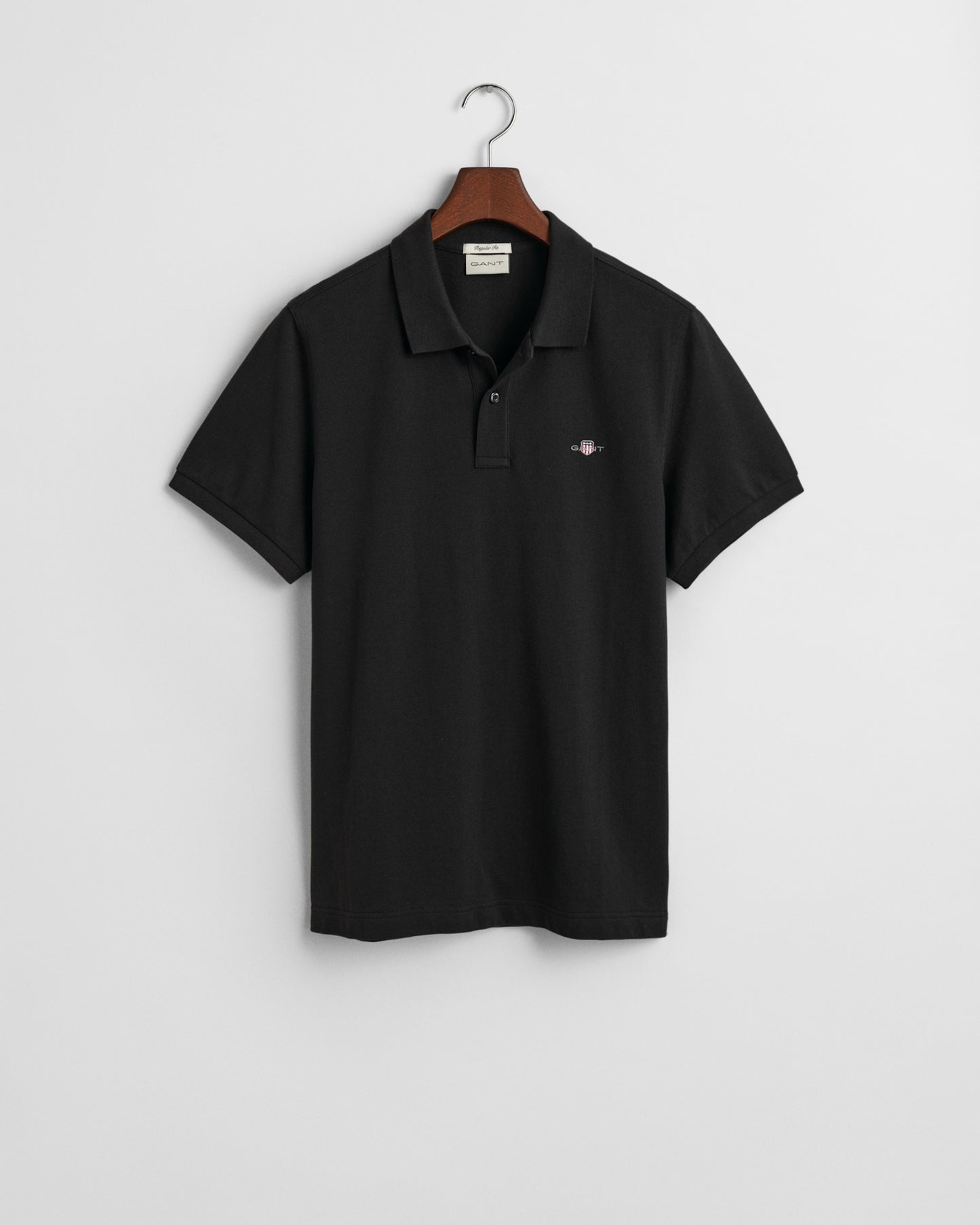 BLACK, REG SHIELD SS PIQUE POLO, FLAT-LAY BY GANT AU.
