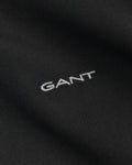 BLACK, REG PINPOINT OXFORD SHIRT, FLAT-LAY BY GANT AU.