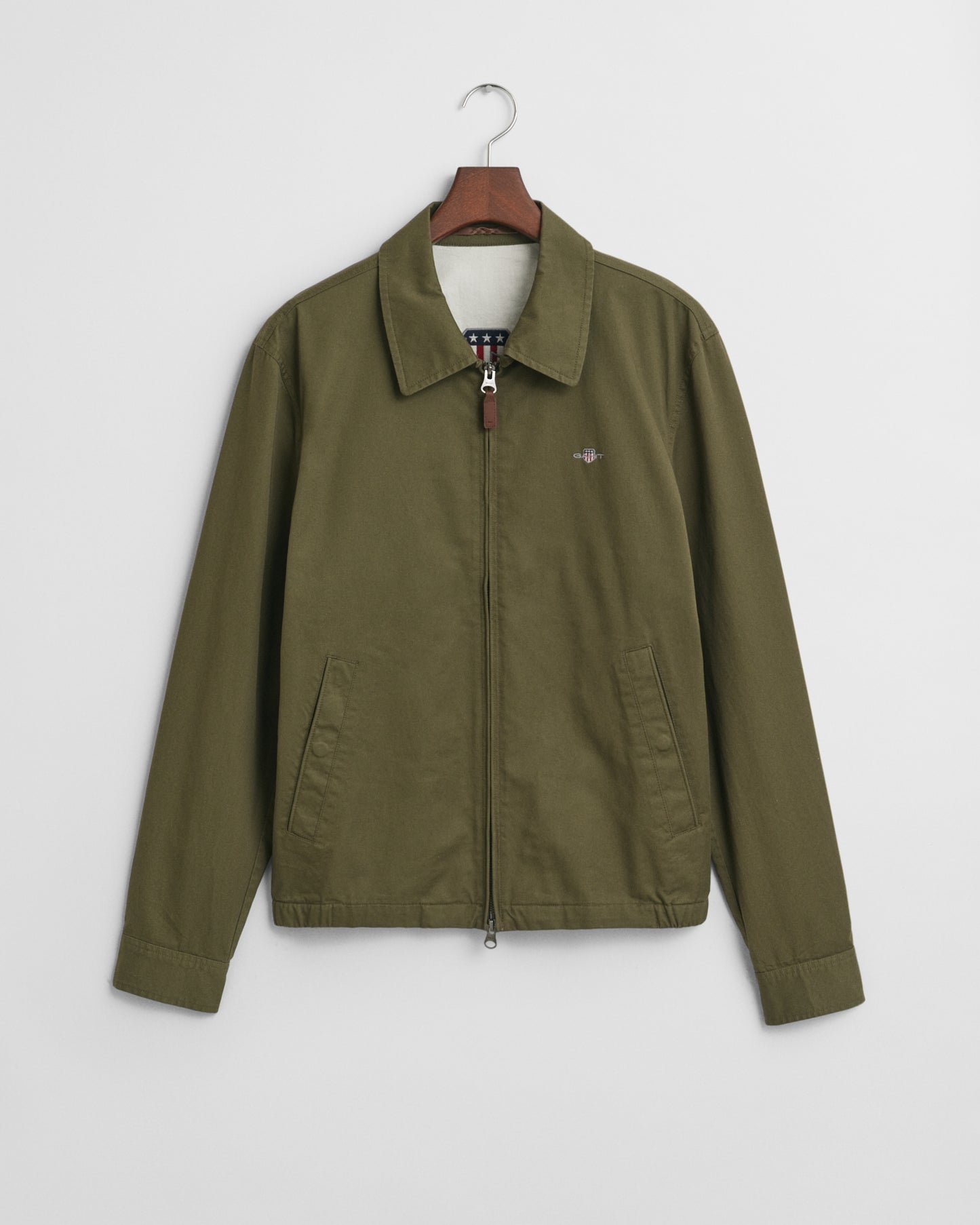 JUNIPER GREEN, COTTON WINDCHEATER JACKET, FLAT-LAY BY GANT AU.