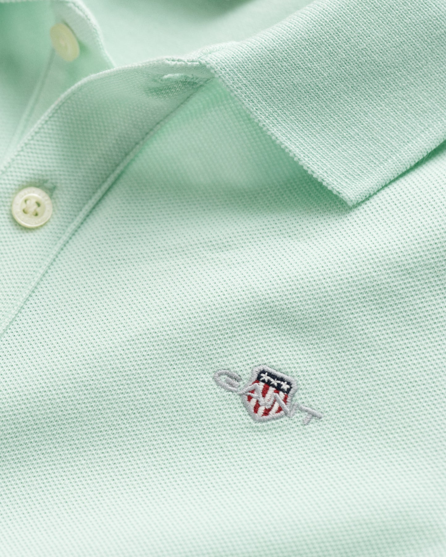 FADED MINT, SHIELD SS PIQUE, CLOSE-UP BY GANT AU.