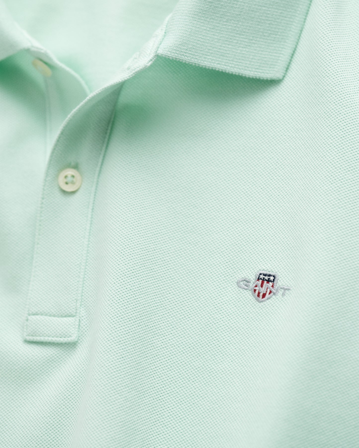 FADED MINT, SHIELD SS PIQUE, CLOSE-UP BY GANT AU.