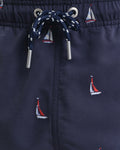 MODEL WEARING BOAT EMBROIDERY SWIM SHORTS