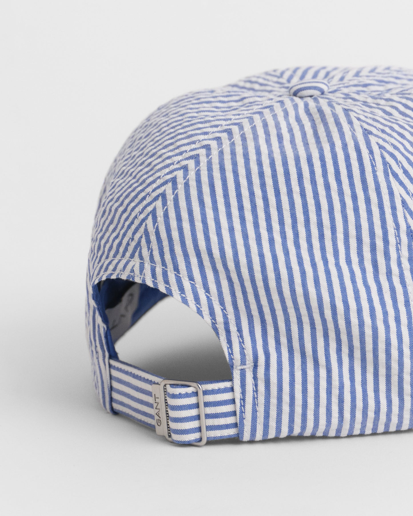 RICH BLUE, STRIPED SEERSUCKER CAP, CLOSE-UP BY GANT AU.