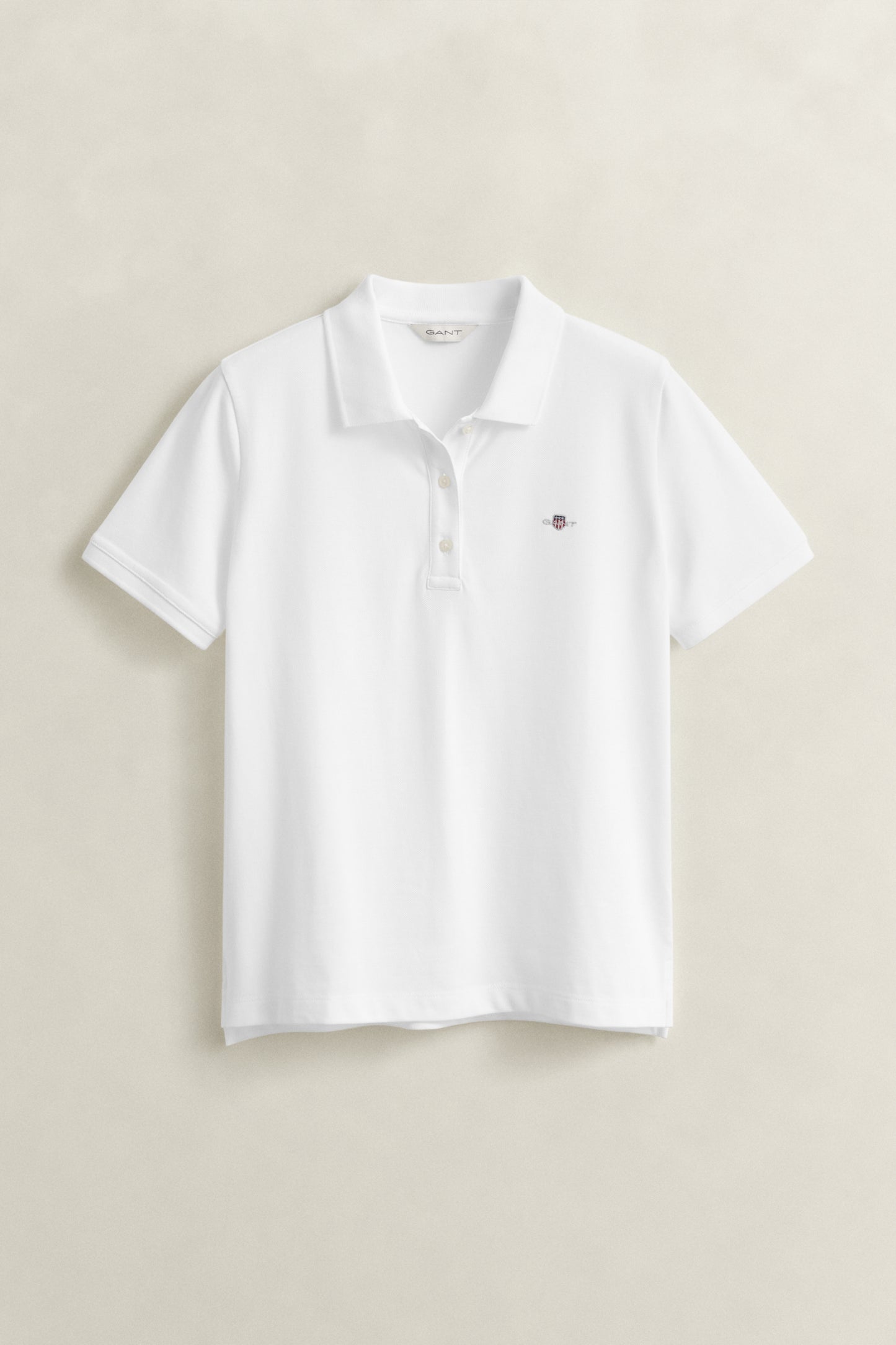 WHITE, REG SHIELD SS PIQUE POLO, FLAT-LAY BY GANT AU.