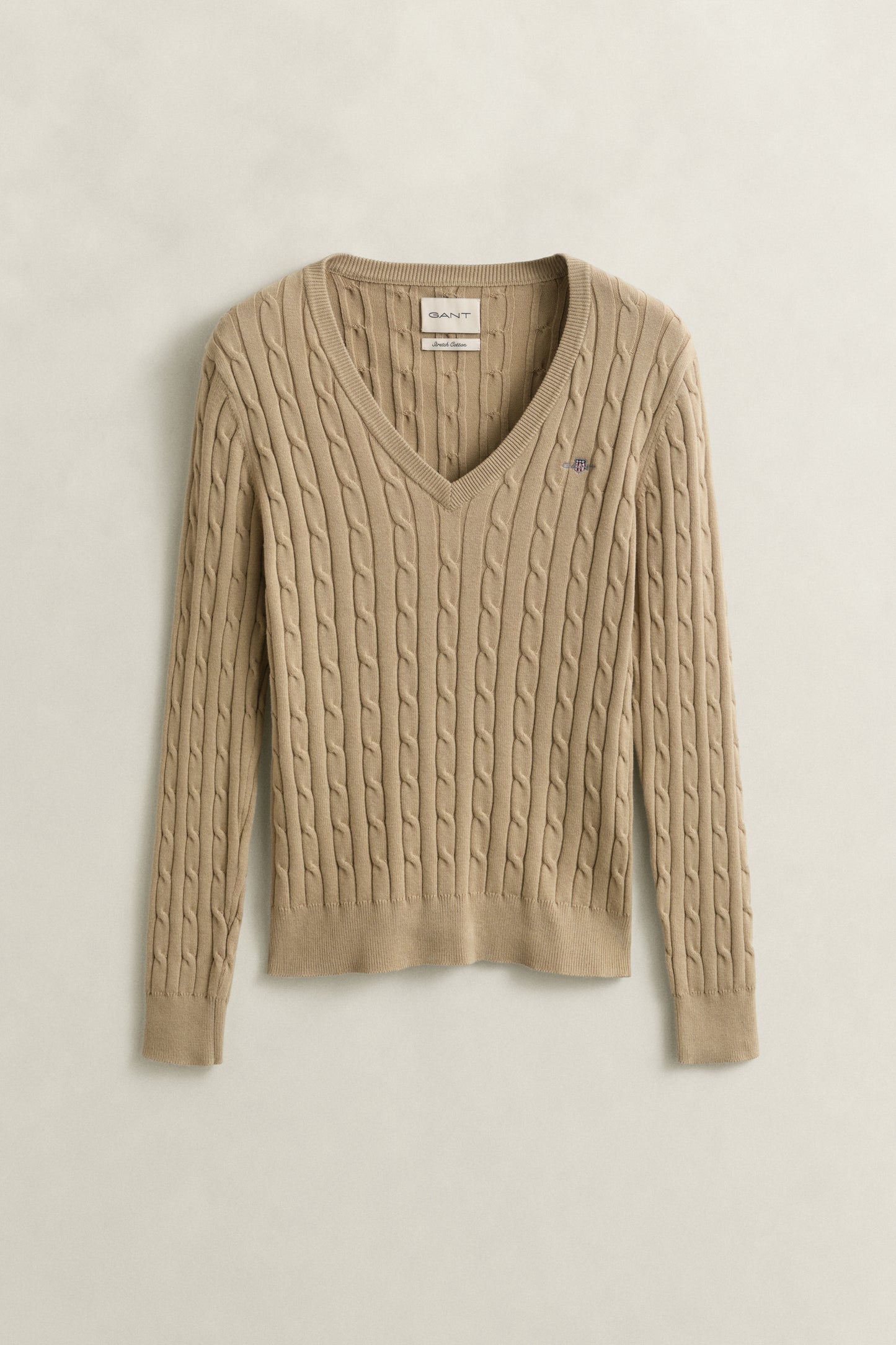 OAT BEIGE, STRETCH COTTON CABLE V-NECK, FLAT-LAY BY GANT AU.