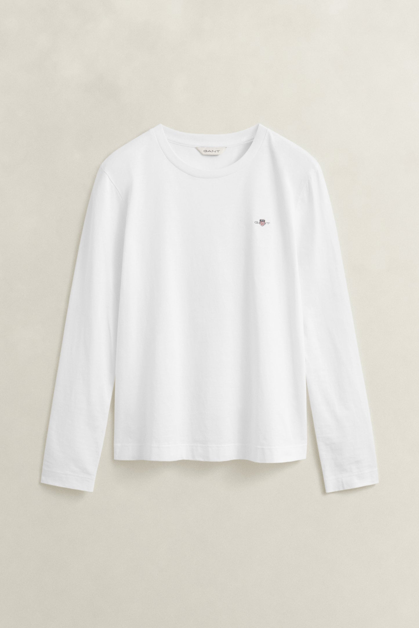 WHITE, REG SHIELD LS T-SHIRT, FLAT-LAY BY GANT AU.