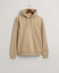 CONCRETE BEIGE, REG TONAL SHIELD HOODIE, FLAT-LAY BY GANT AU.