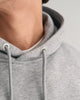 GREY MELANGE, REG MEDIUM ARCHIVE SHIELD HOODIE, CLOSE-UP BY GANT AU.