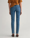 MID BLUE BROKEN IN, SLIM SUPER STRETCH JEANS, BACK-VIEW BY GANT AU.