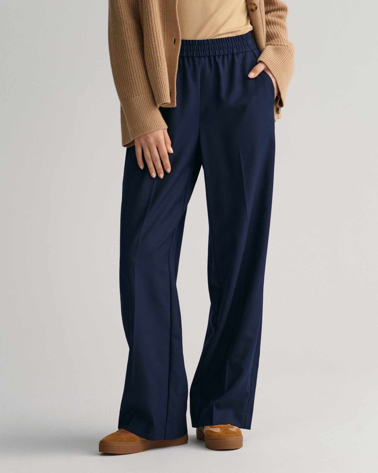 MODEL WEARING RELAXED PULL ON PANTS