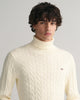 MODEL WEARING COTTON CABLE TURTLE NECK