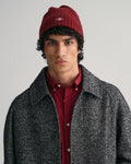 PLUMPED RED, UNISEX. SHIELD WOOL BEANIE BY GANT AU.