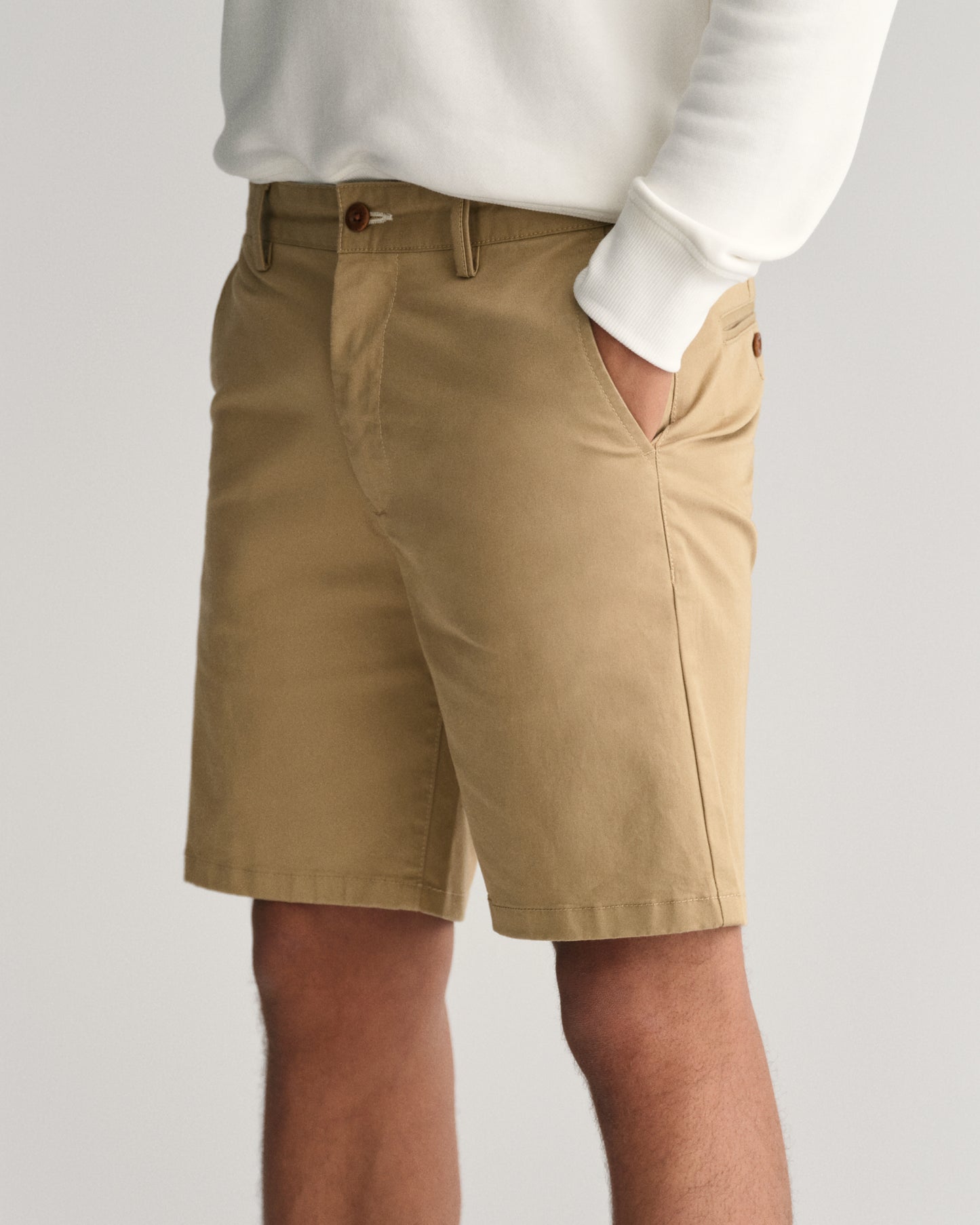 MODEL WEARING CHINO SHORTS
