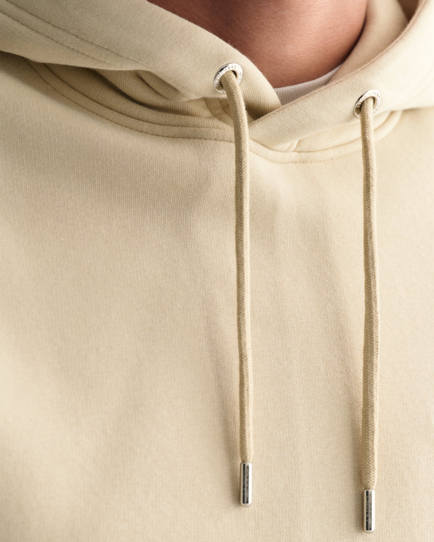 MODEL WEARING REG SHIELD HOODIE