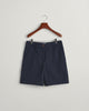 EVENING BLUE, CHINO SHORTS, FLAT-LAY BY GANT AU.