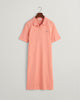 PEACHY PINK, SLIM SHIELD SS PIQUE POLO DRESS, FLAT-LAY BY GANT AU.