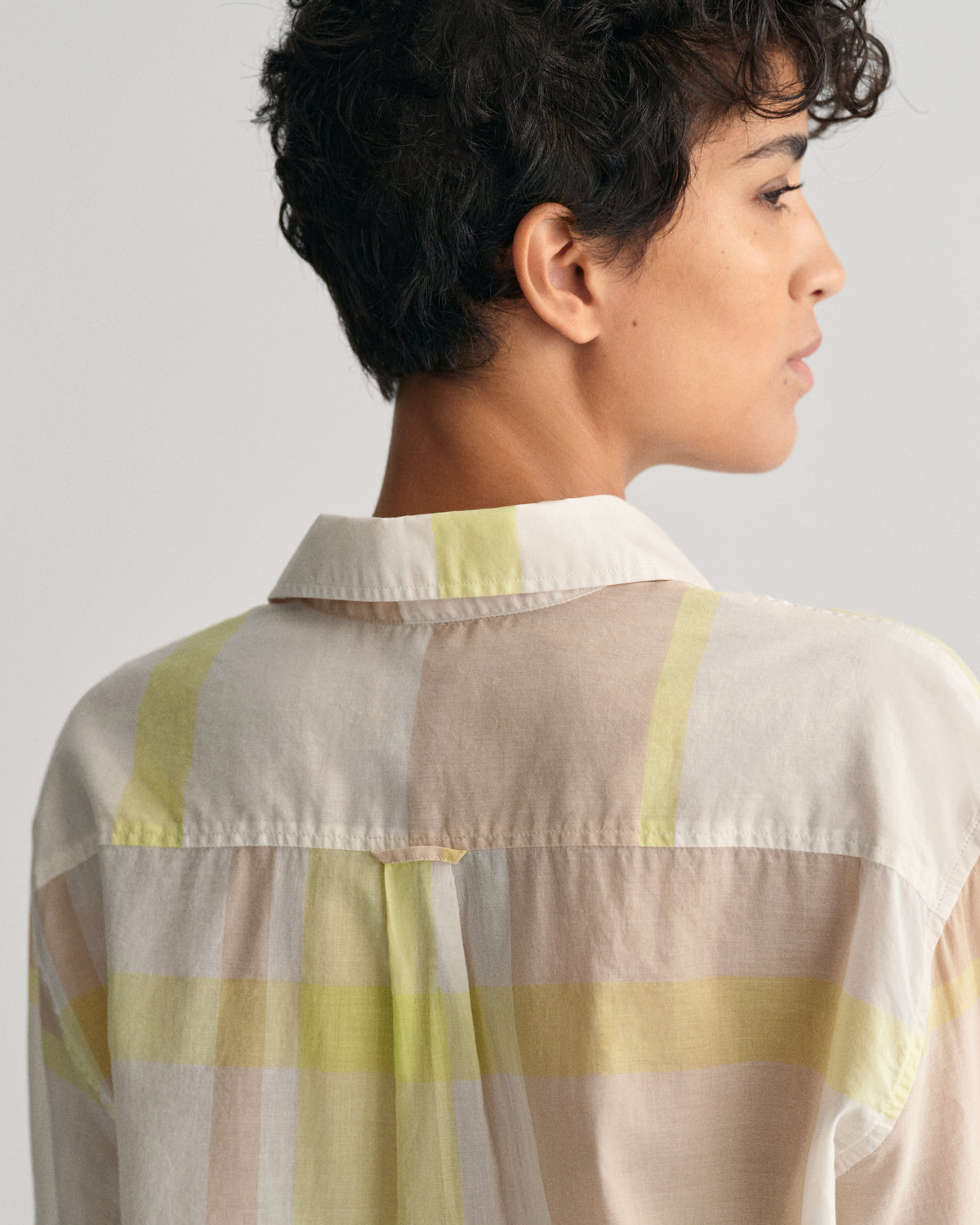 MODEL WEARING REL MADRAS CHECK SHIRT