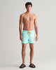 TURQUOISE MIST, SWIM SHORTS BY GANT AU.