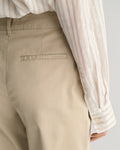 MODEL WEARING SLIM CHINOS