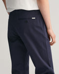 MODEL WEARING GANT CHINO