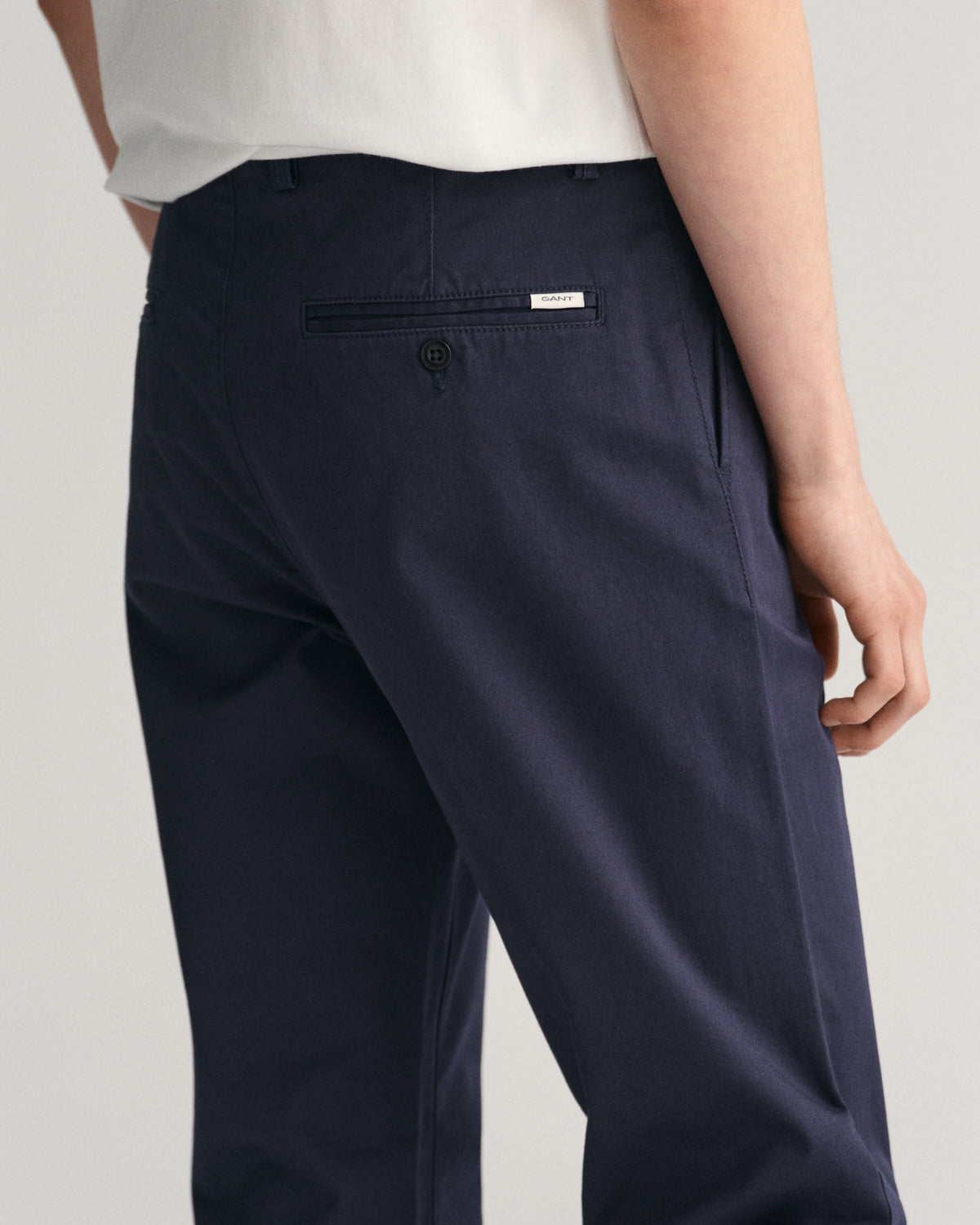 MODEL WEARING GANT CHINO
