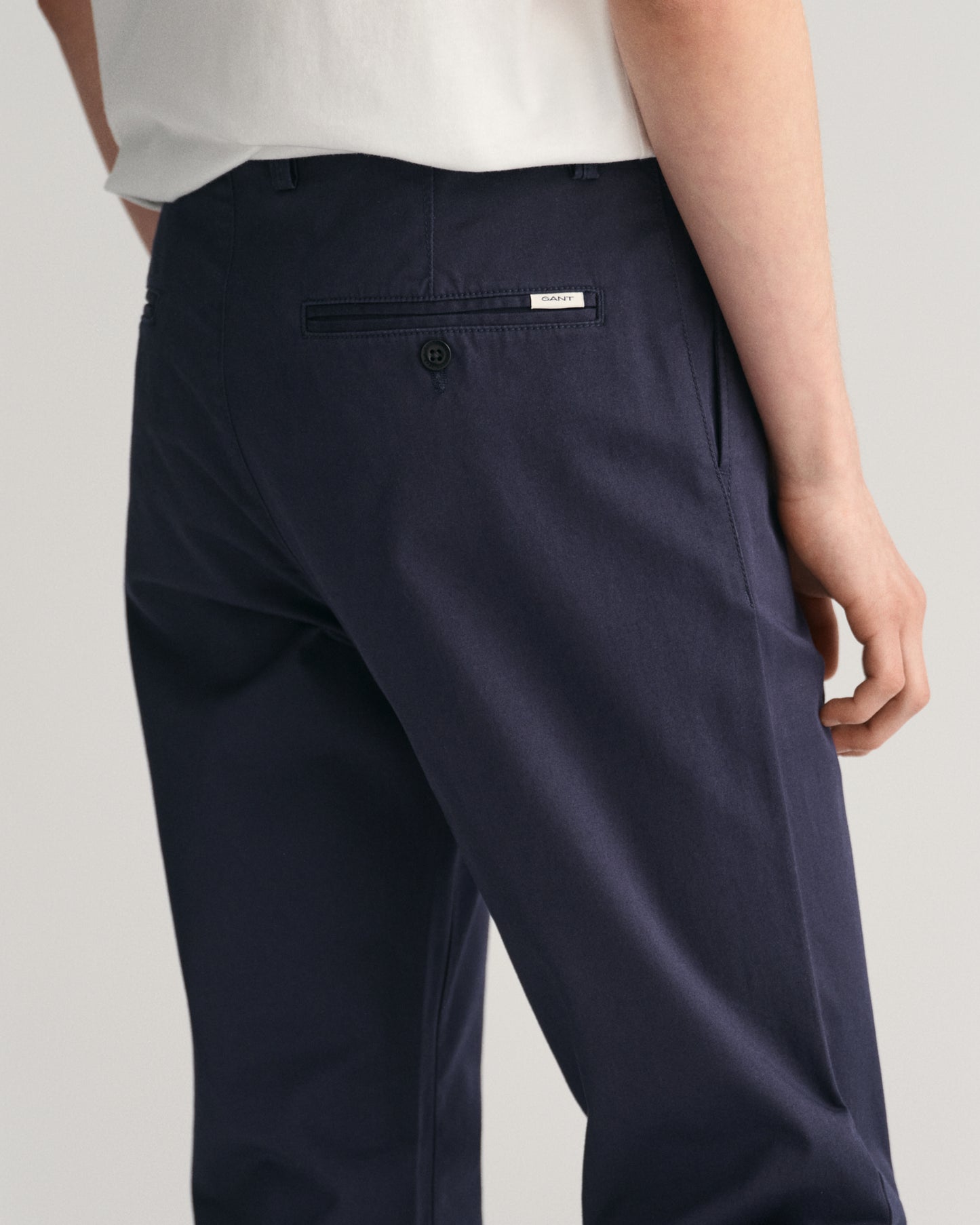 MODEL WEARING GANT CHINO