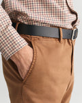 MODEL WEARING SLIM DOBBY STRUCTURE CHINOS