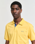 FADED SUNSET, REG CONTRAST PIQUE SS POLO, CLOSE-UP BY GANT AU.