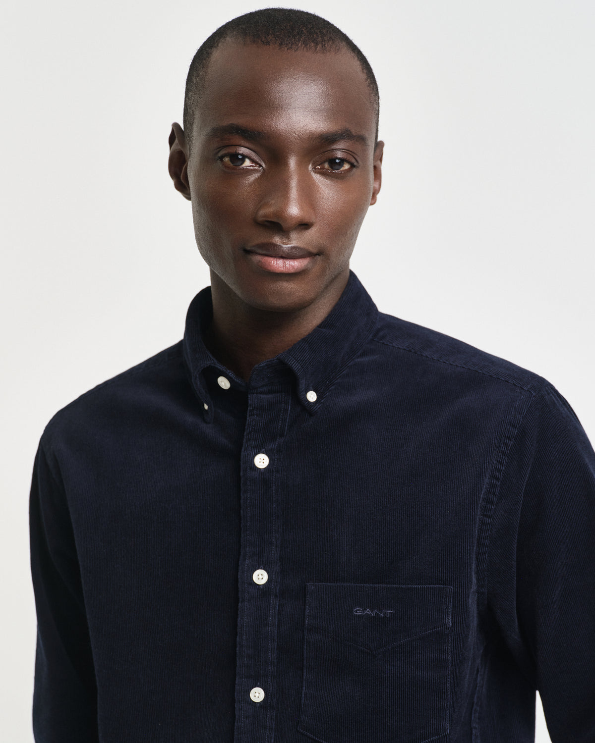 MODEL WEARING REG UT CORDUROY SHIRT