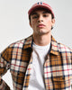 MODEL WEARING HERRINGBONE CHECK OVERSHIRT