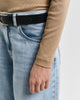 MODEL WEARING SLIM RIB TURTLENECK