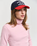 MODEL WEARING SLIM RIB TURTLENECK
