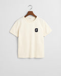 CREAM, REG G BADGE SS T-SHIRT, FLAT-LAY BY GANT AU.