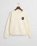 CREAM, G BADGE C-NECK SWEAT, FLAT-LAY BY GANT AU.