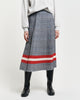 MODEL WEARING CHECK PRINT PLEATED SKIRT