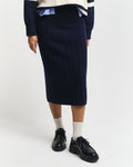 MODEL WEARING WIDE RIBBED WOOL SKIRT