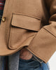 MODEL WEARING CROPPED WOOL JACKET