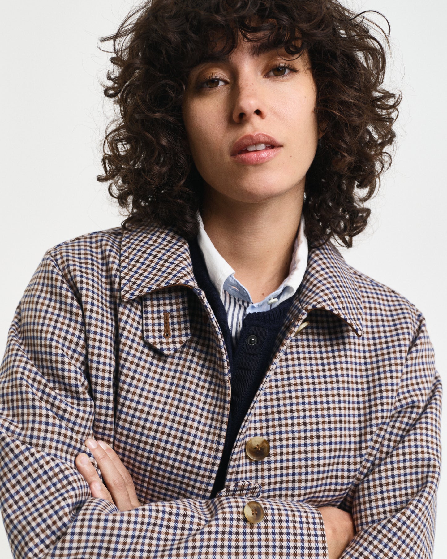 MODEL WEARING MINI CHECKED CAR COAT