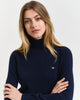 MODEL WEARING EXTRAFINE LAMBSWOOL BLEND ROLLNECK