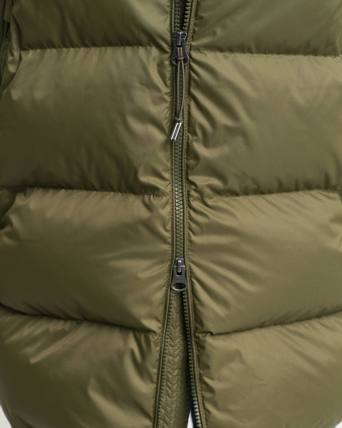 MODEL WEARING ACTIVE CLOUD MID LENGTH JACKET