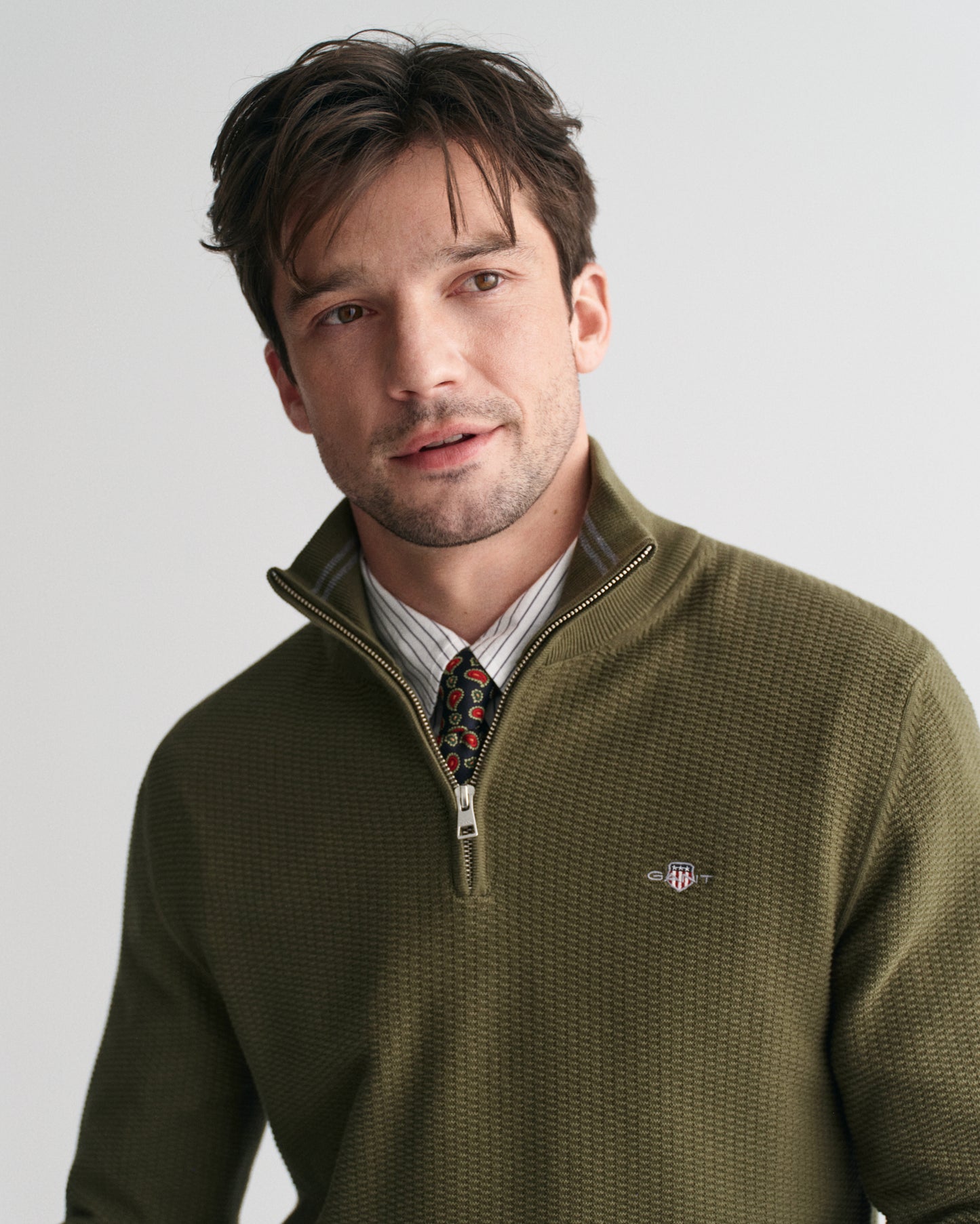 JUNIPER GREEN, COTTON MICRO TEXTURED HALF ZIP, CLOSE-UP BY GANT AU.